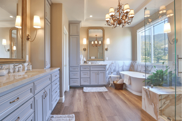 Spa-like Master Bath with Gray Cabinetry and Natural Stone