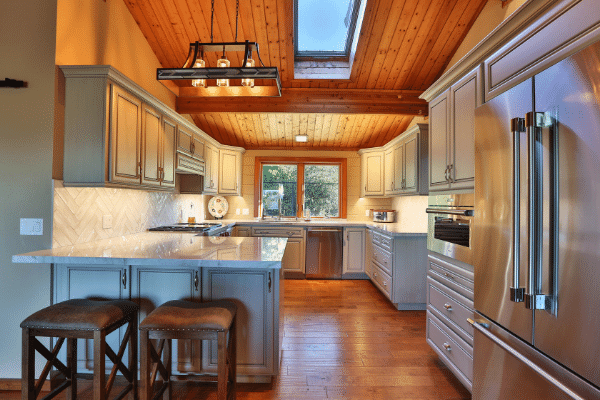 Wood celling with skylight and hardwood floor. 